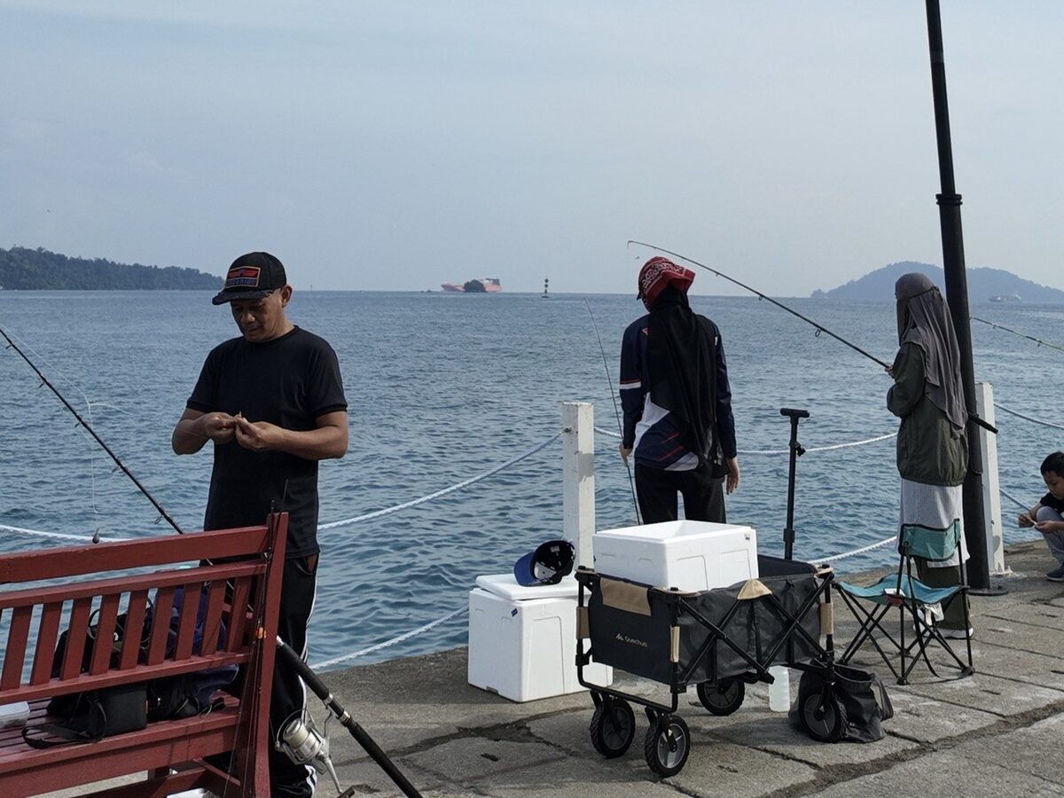 Fishing from the jetty with the islands beyond